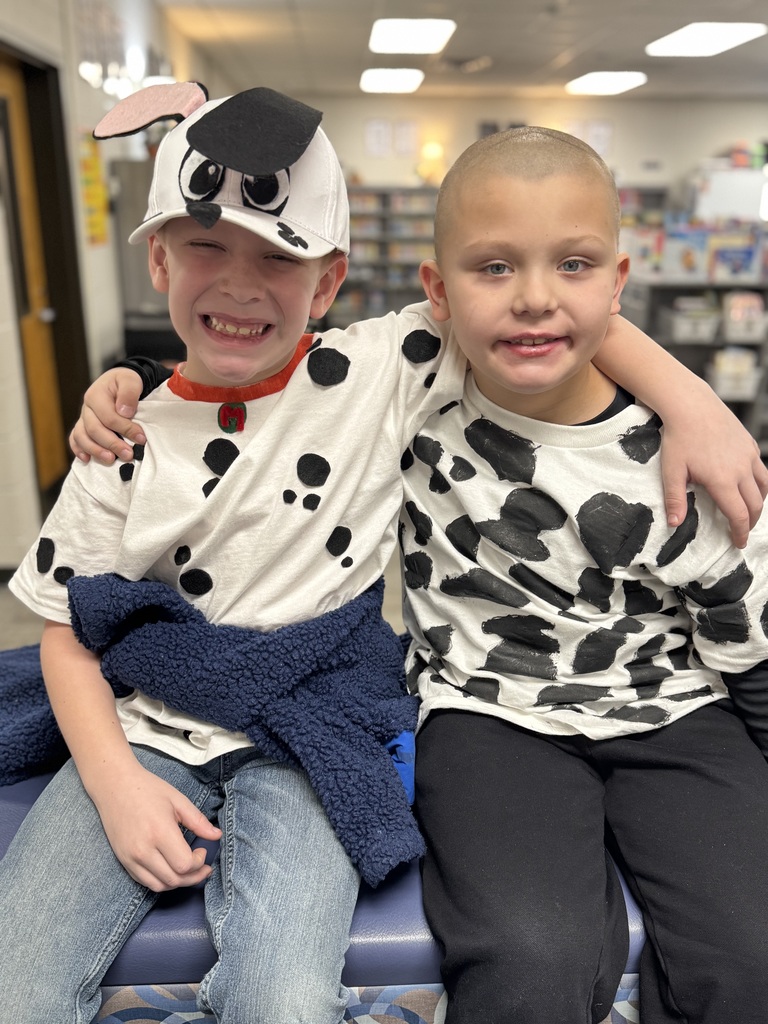 2 boys dressed up as dalmations