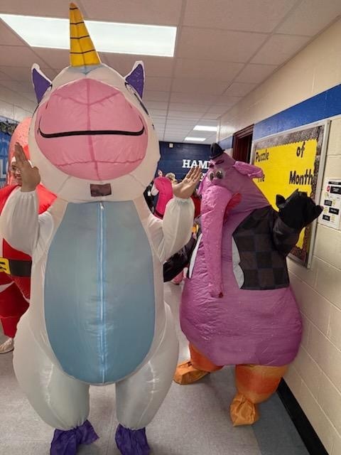 WOW WOW WOW! Our 🌟Knights🌟 came through in a big way to raise money to support Mrs. Perry's fundraising endeavors for Good Neighbor Homeless Shelter and Backpack Buddies! The final top 8 staff members students selected for the run: 8th Place - Mrs. Heather 7th Place - Ms. Lochridge 6th Place - Ms. Steed 5th Place - Mr. Bunch 4th Place - Mr. Freddy 3rd Place - Ms. Felker 2nd Place - Mr. Posey Annnnnnnnddddd...... 1st Place - Mr. Jones Our Knights raised a grand total of $801 !!!! And the winners of the Derby were.... 🏅1st Place - Mr. Posey as Patrick 🏅2nd Place - Ms. Heather as a Horse 🏅3rd Place - Mr. Jones as a Unicorn 📣Thanks to the Pterodactyl (Ms. Debra) and the Dancing Hippo (Mrs. Perry) for cheering our racers on through the entire course! 💙A GREAT TIME WAS HAD BY ALL!!!!💙