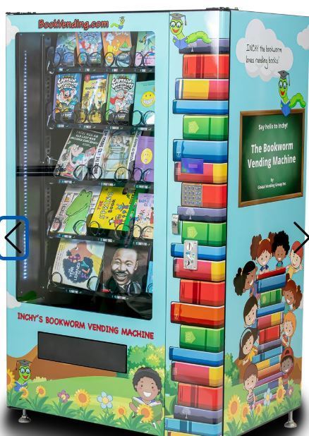 A colorful vending machine with books displayed inside. The machine is labeled "The Bookworm Vending Machine".