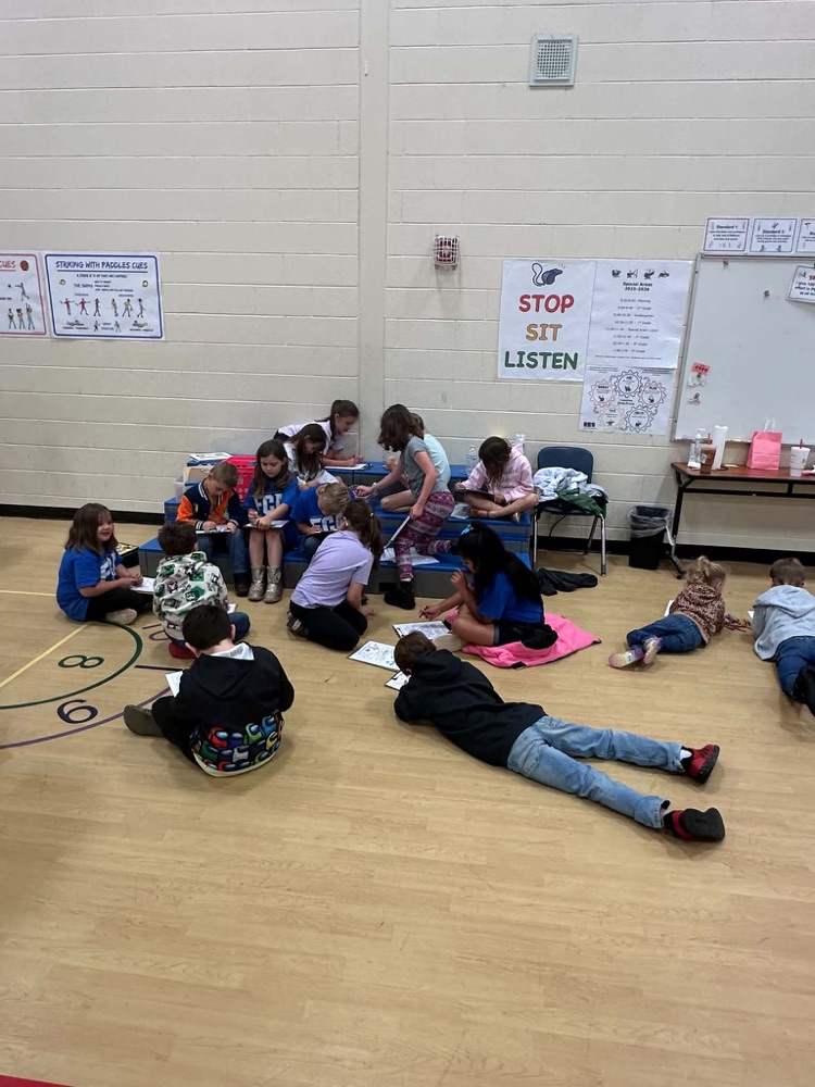 students working on a paper