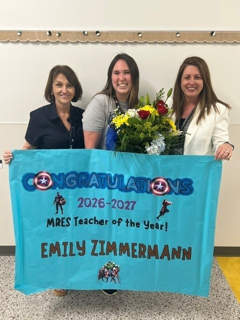 Our teacher of the year Ms. Zimmerman smiling for a picture with Mrs. Wynn and Mrs. Stephens.