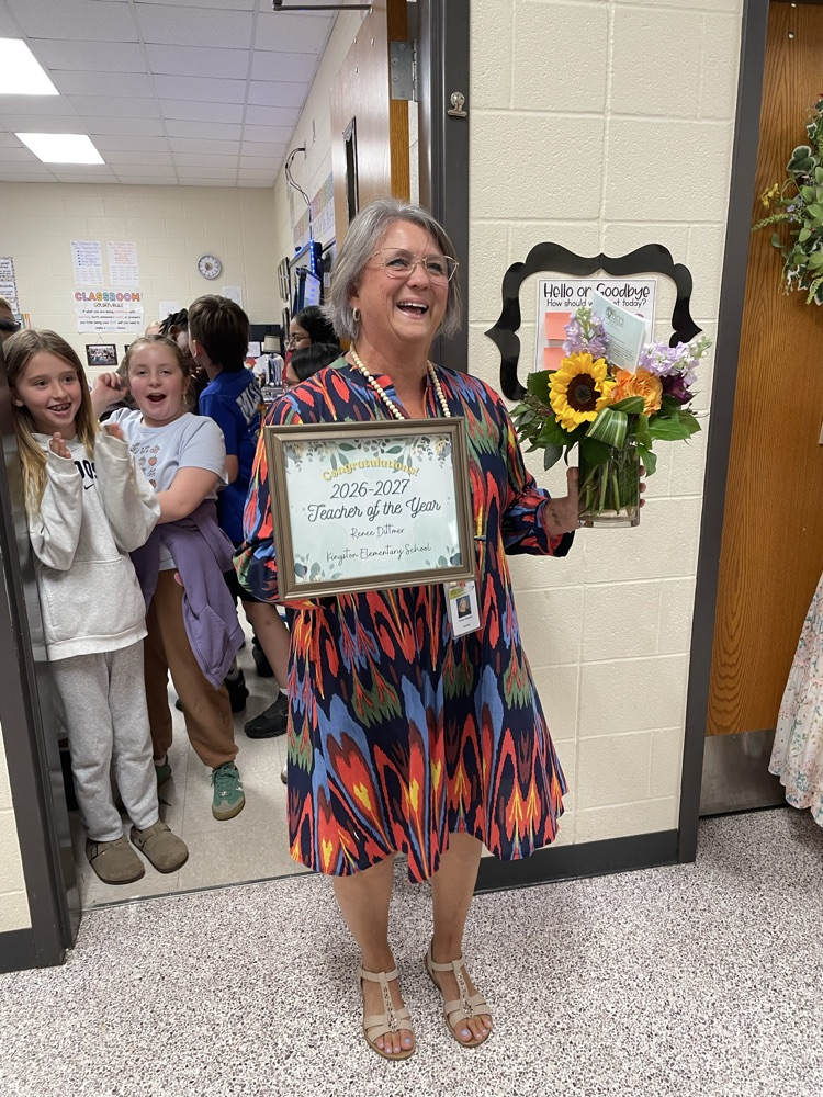 Mrs. Dittmer when she was awarded her certificate and flowers  