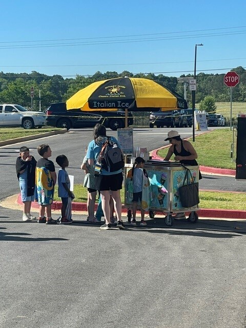 Students waiting in line for Goodies with Grace shaved ice.
