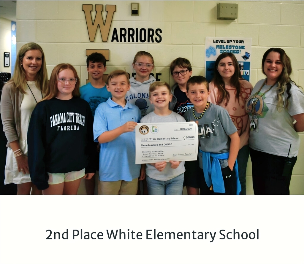 Students and adults at White Elementary School stand behind a child holding a certificate. "2nd Place White Elementary School" is at the bottom.