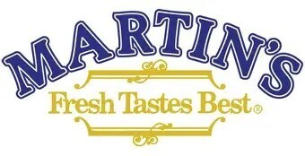 Logo for Martin's featuring blue text, golden frame, and tagline "Fresh Tastes Best" against a white background.