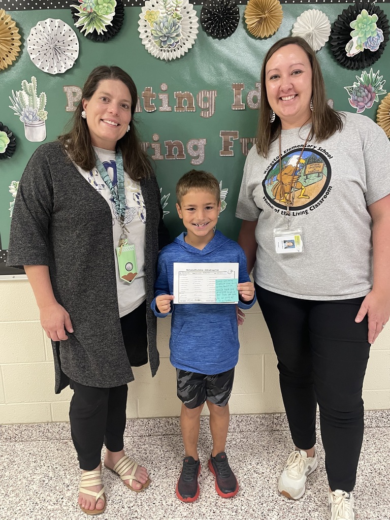 Dr. Payne, Lennox, and Mrs. LaRue celebrating his positive office referral.