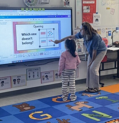 Mrs. Calhoun is talking to a student about her math reasoning.