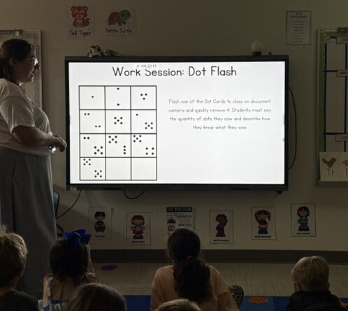 Kindergarten class participating in a math activity call dot flash.