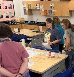 Teachers collaborating about math vocabulary.
