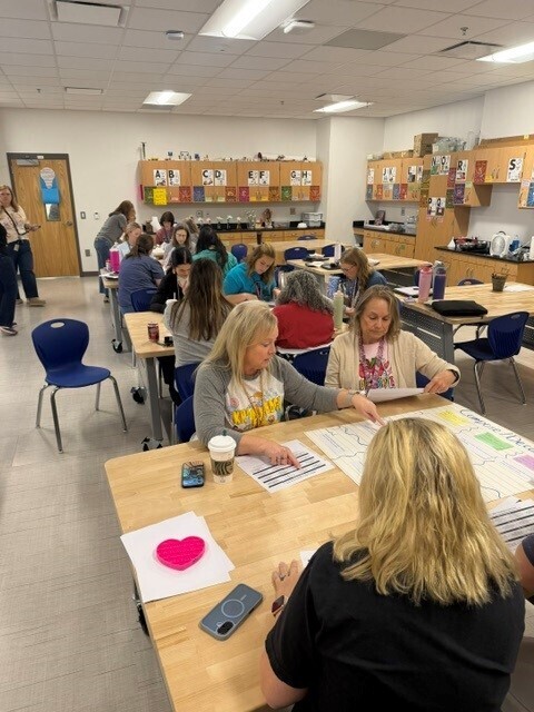 Teachers collaborating about math vocabulary.