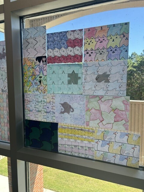 Student artwork is displayed in the math hall.