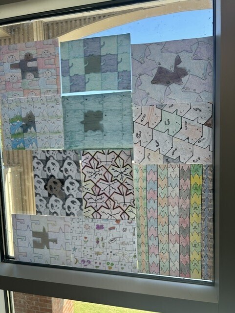 Student artwork is displayed in the math hall.