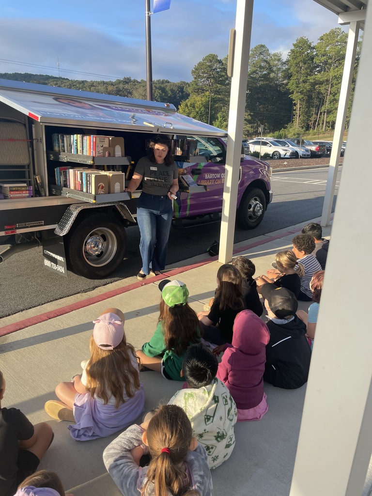 students at a bookmobile