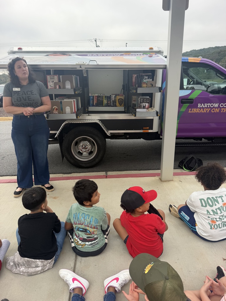 students at a bookmobile