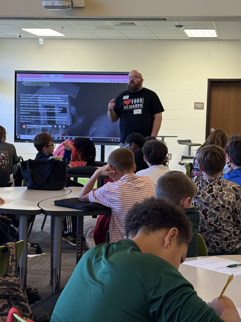 man presenting to students
