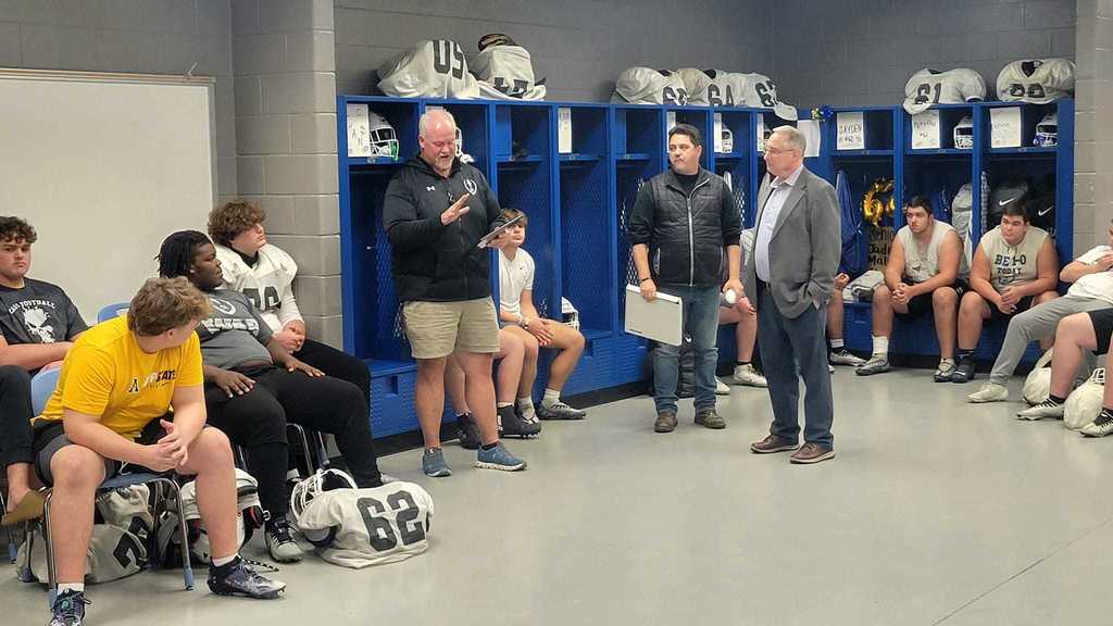 Cass High School Football team accepting award