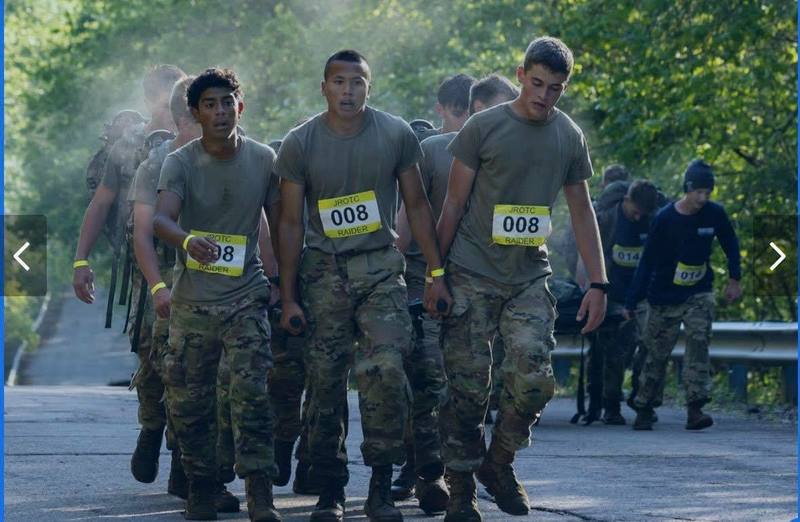 tired raiders walk up hill