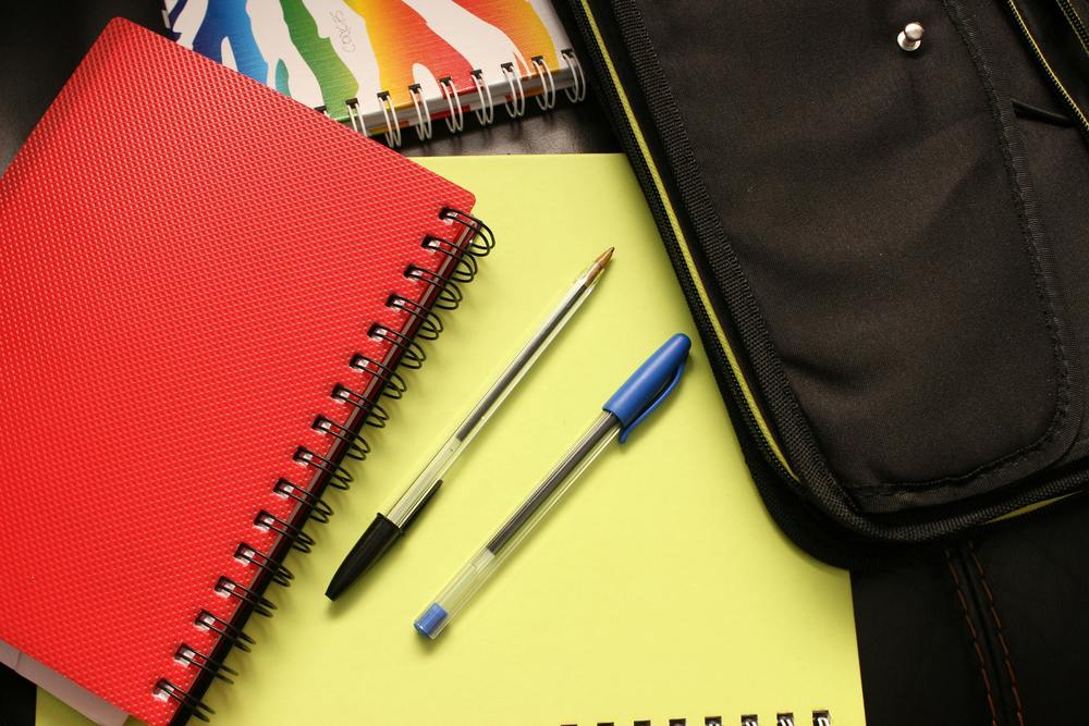 notebook and pens