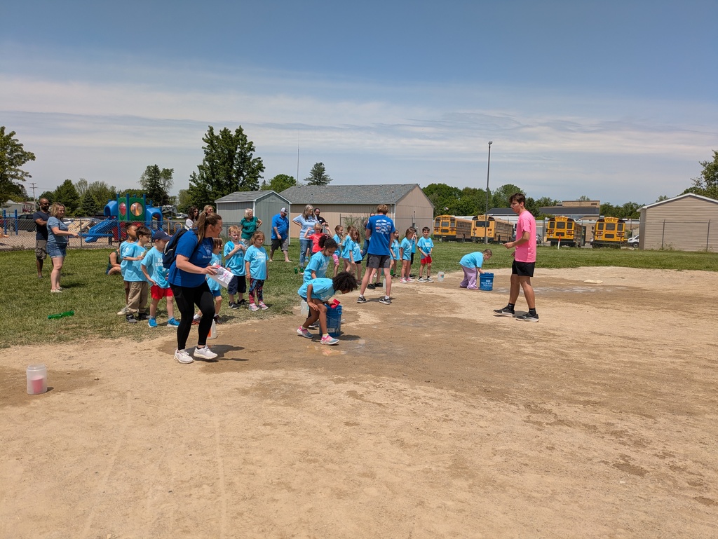 Students doing a water relay