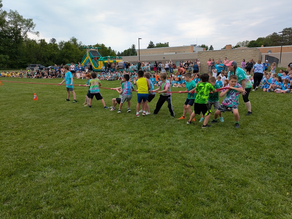 Students pulling on rope in tug of war