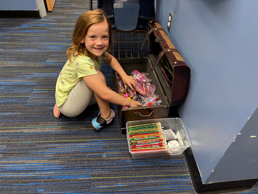 student picking a prize