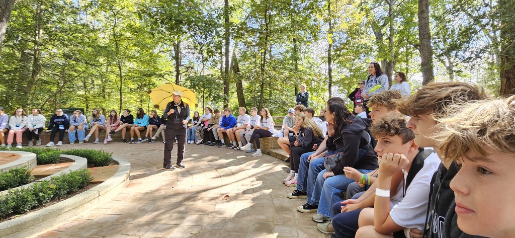 Students listening to a speaker