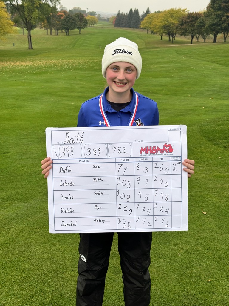 Student with her scorecard