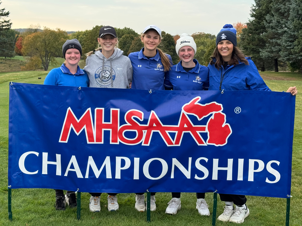 Golf team holding MHSAA Championships