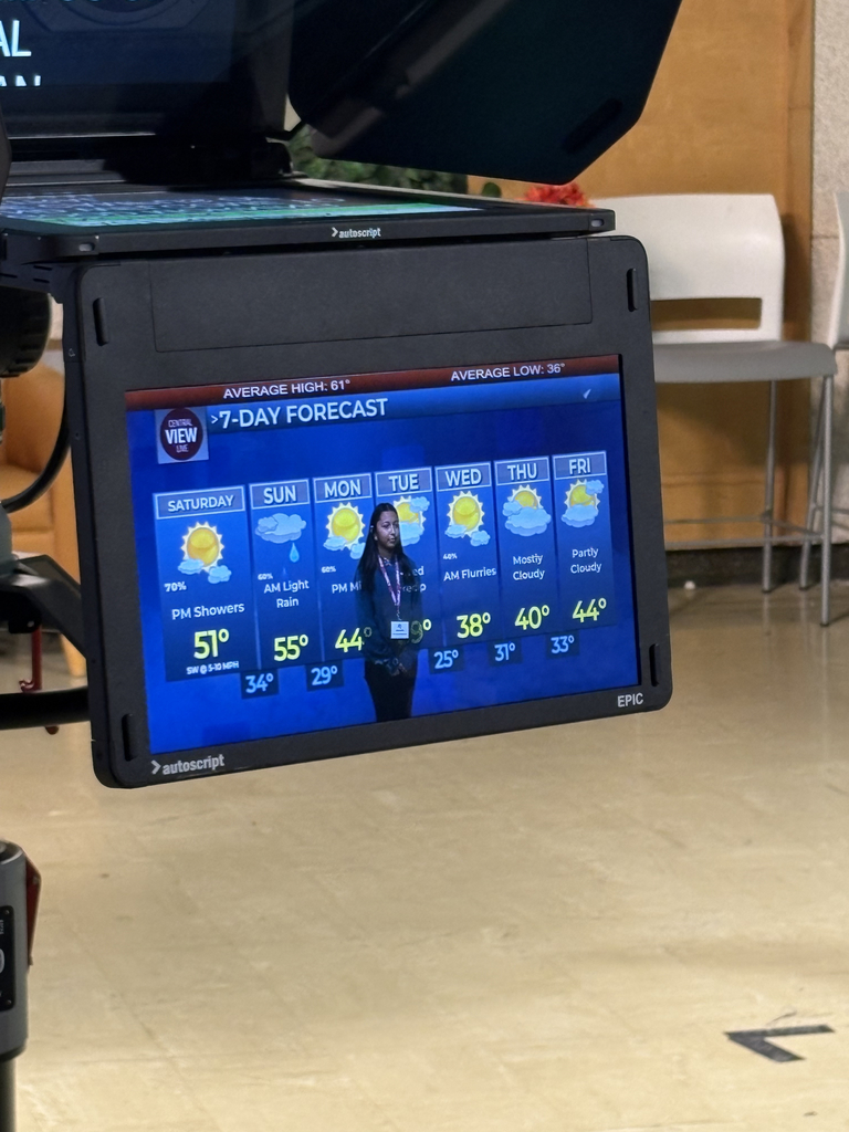 Monitor showing student with weather backdrop