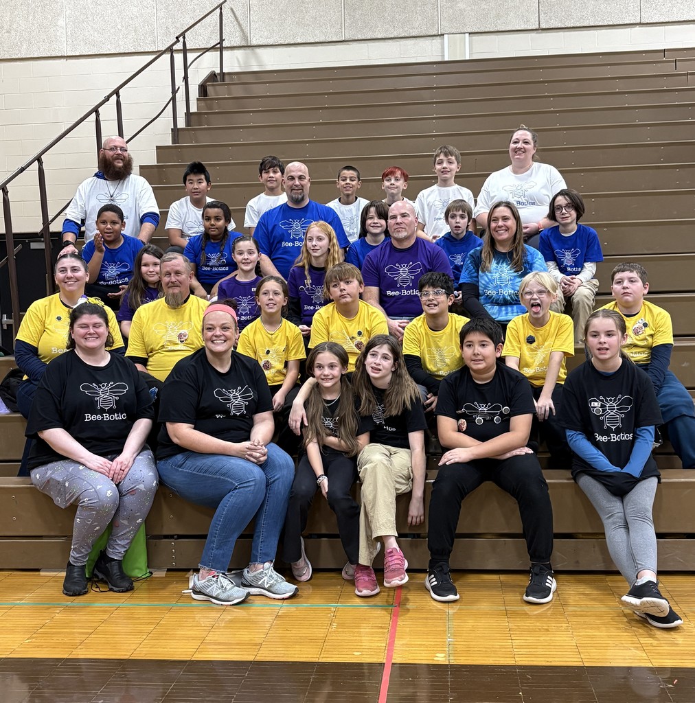 Bee-Botics teams sitting on bleechers