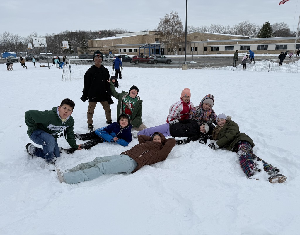 Students lounging in the snow.