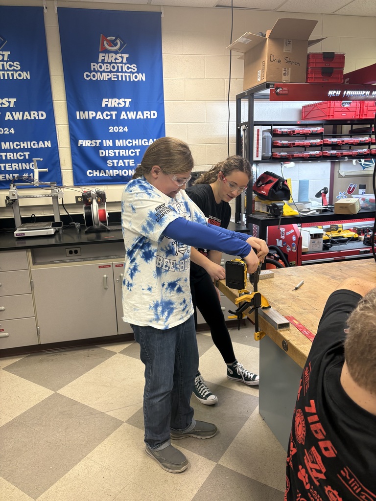 Student using a drill