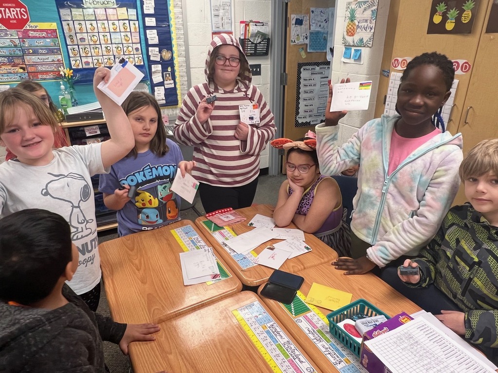 Students canceling stamps on letters