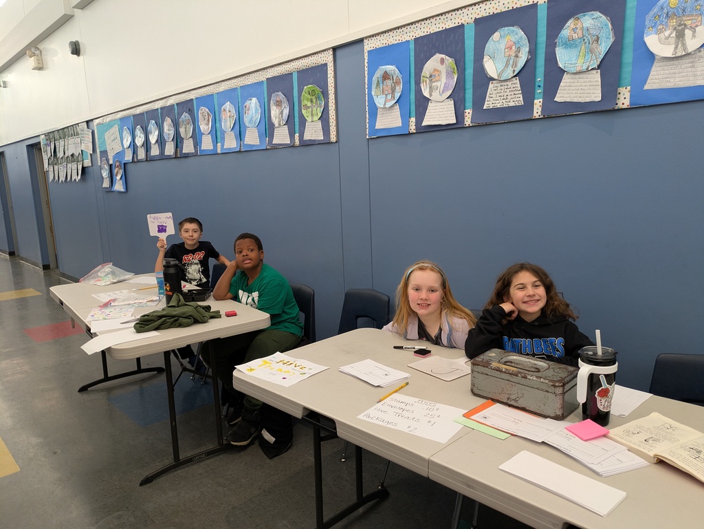Students selling stamps and snack packs