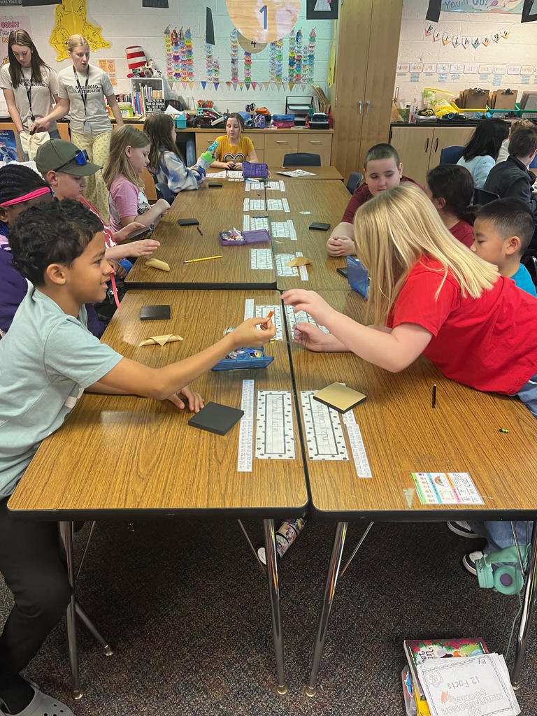Students working at tables
