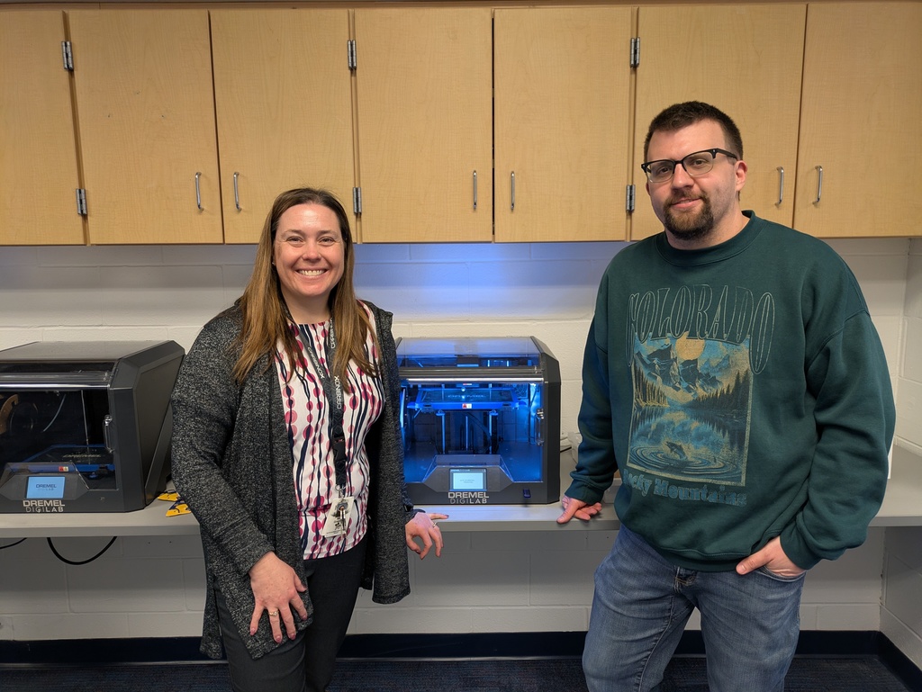 Mrs. Grennell and Mr. Curl with the 3d printer