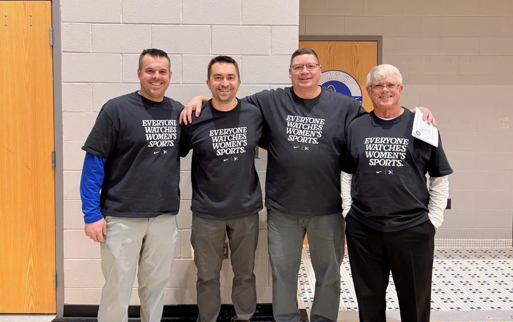 Coaches with matching shirts