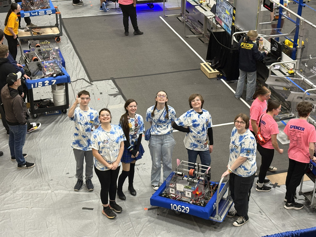 The team next to their robot