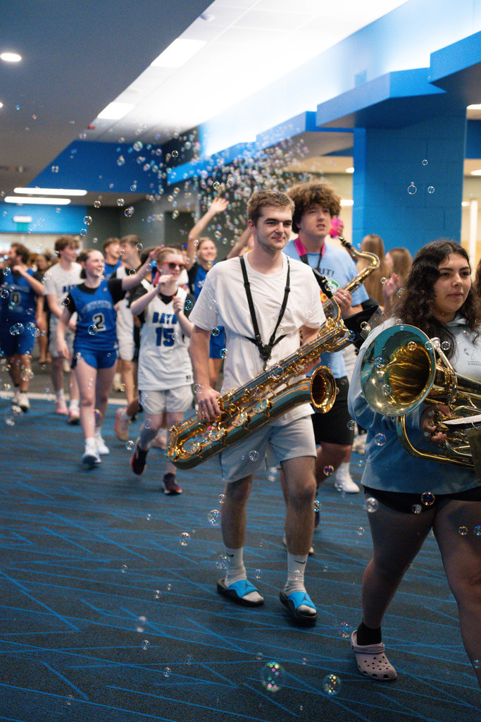 BHS Band leading the Unified teams through the hallway