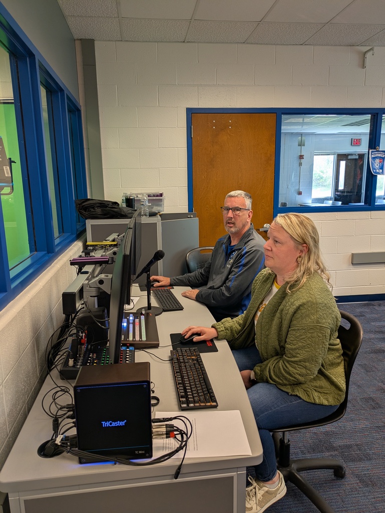Teachers sitting at the table with the equipment