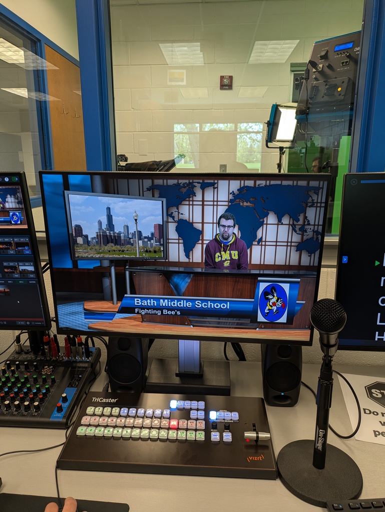 Computer screen with Mr. Curl on a newscast