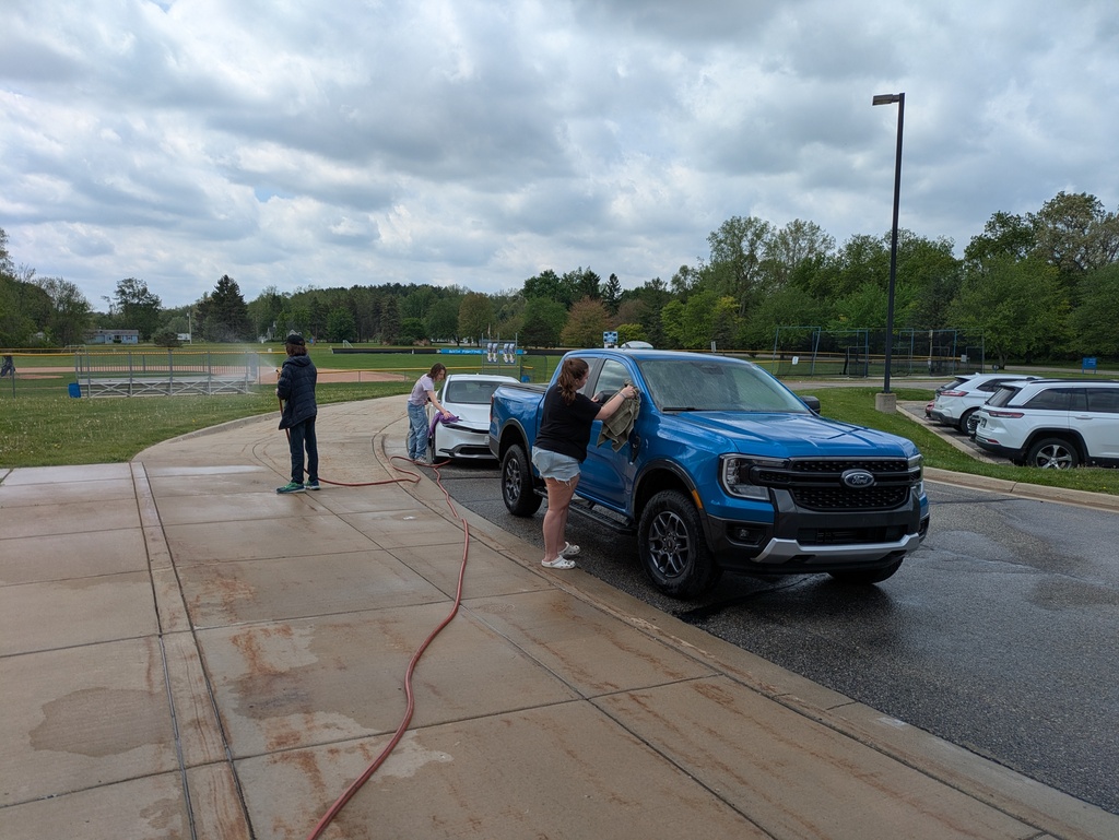 Students washing cars at Bath High School