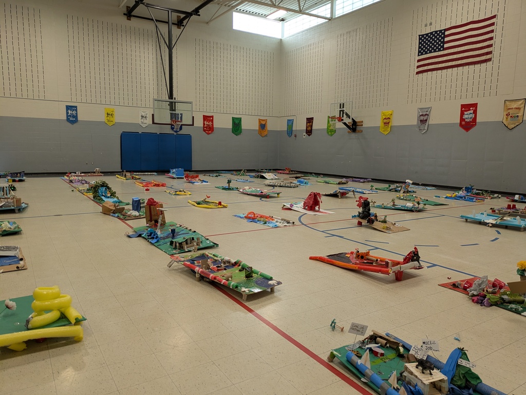 Picture of gym showing the mini golf course laid out on the floor