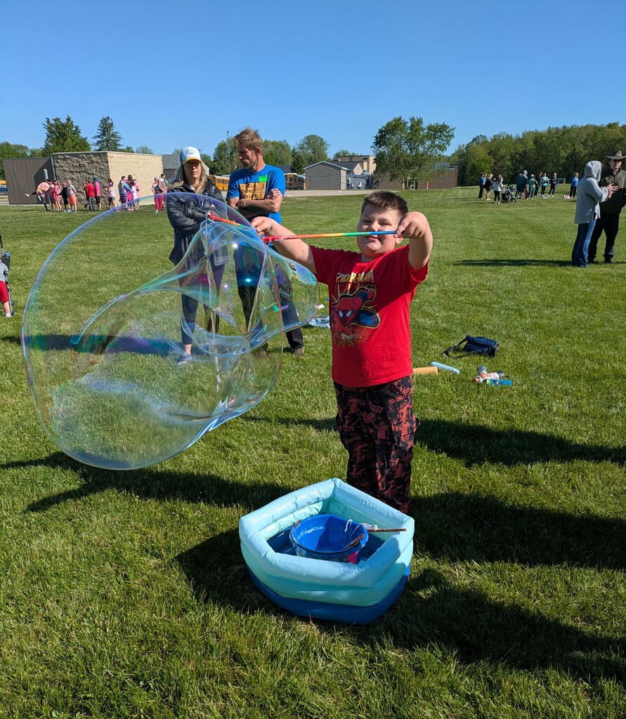 Boy with a large bubble