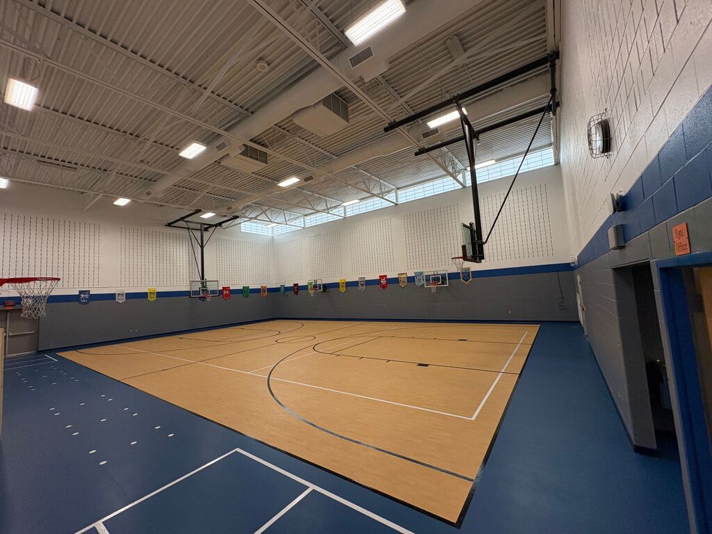 New gym floor and gray and white painted walls