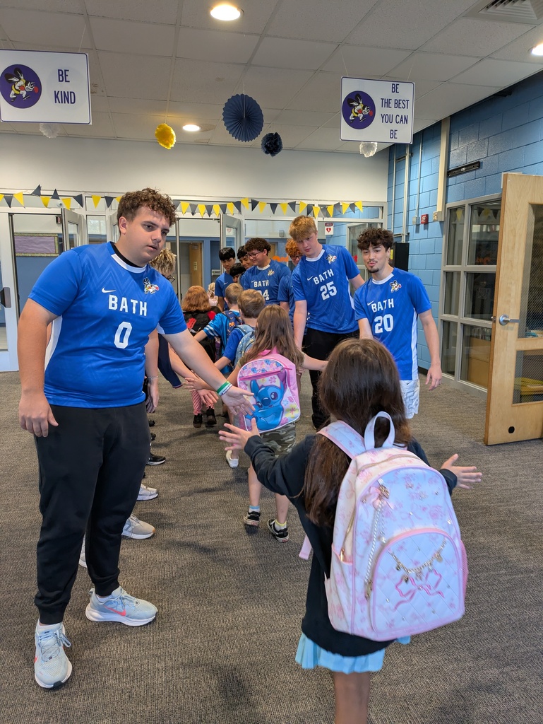 Students being greeted by team members