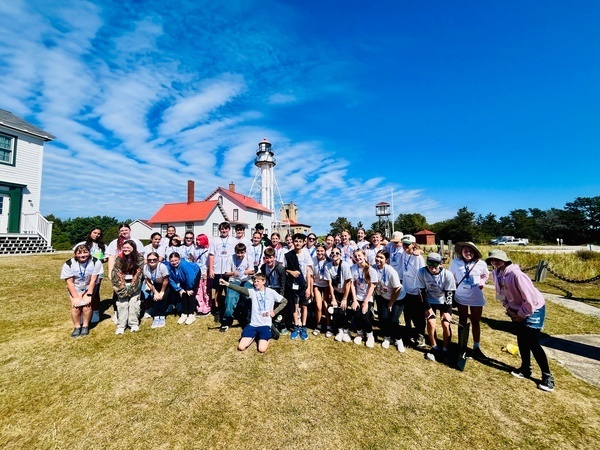 Students posing for a photo at the Great Lakes Shipwreck Museum.