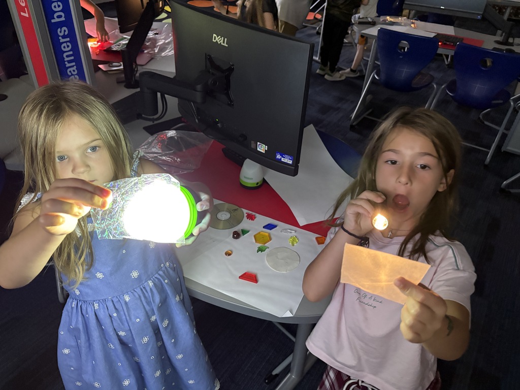 Girls with flashlights