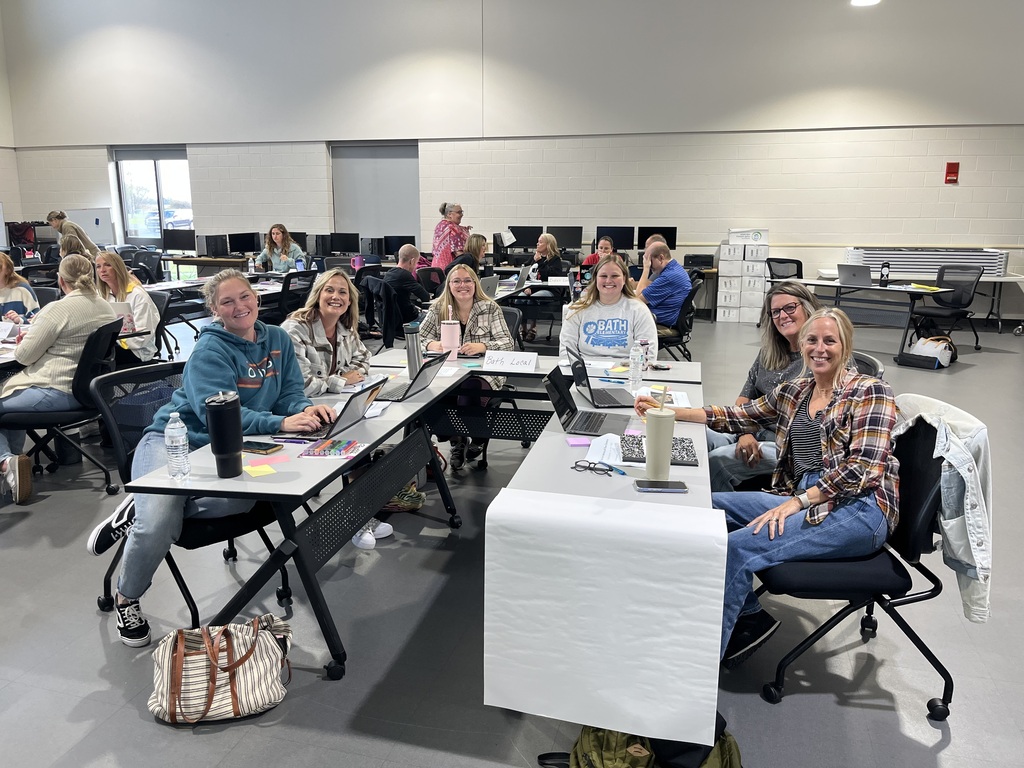 Staff in a classroom working together