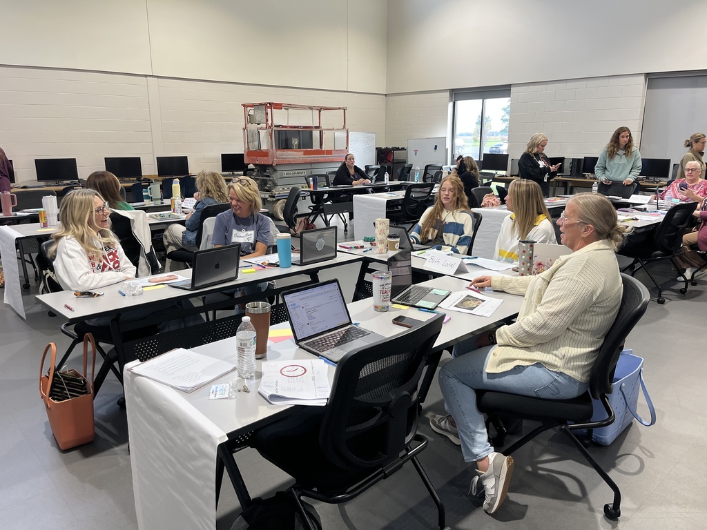 Staff in a classroom working together